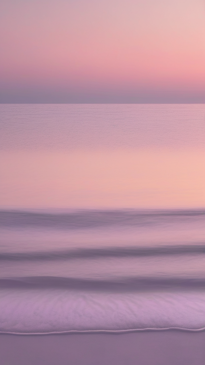 Pastel sunrise over calm sea