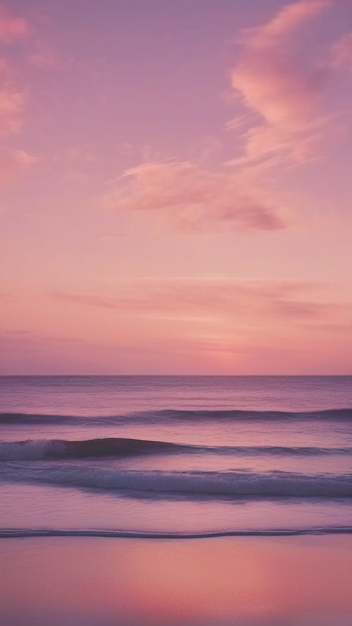 Peach and lilac sky over sea