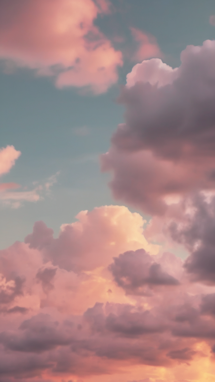 Soft pastel sunset clouds wallpaper
